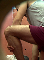 Horny young man entering a swimming pool cubicle to change for a swim. by Sneaky Peek