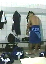 EricDeman catches a hot footballer in the locker room adjusting his towel just before being interviewed and inadvertently revealing his big wet cock. by Eric Deman
