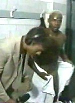 EricDeman catches a hot footballer in the locker room adjusting his towel just before being interviewed and inadvertently revealing his big wet cock. by Eric Deman