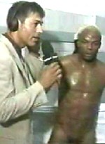 EricDeman catches a hot footballer in the locker room adjusting his towel just before being interviewed and inadvertently revealing his big wet cock. by Eric Deman