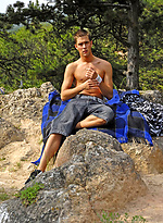 Chris posing outdoors by Boys Nation