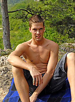 Chris posing outdoors by Boys Nation