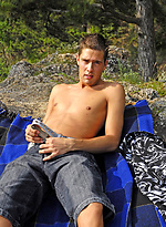 Chris posing outdoors by Boys Nation