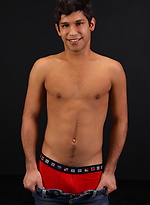 Carmine posing naked in a bedroom by ChaosMen