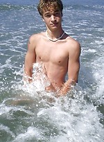 Cute young twink exposing his ass and cock on the sandy beach. by Mount Equinox