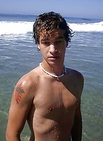 Cute young twink exposing his ass and cock on the sandy beach. by Mount Equinox