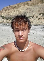 Cute young twink exposing his ass and cock on the sandy beach. by Mount Equinox