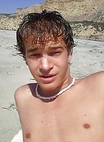Cute young twink exposing his ass and cock on the sandy beach. by Mount Equinox