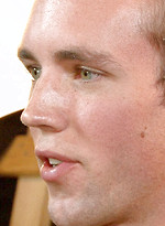 Red hottie Logan Drake strokes dick by Twinks