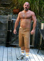 Muscle bear Bronson Gates shows his hairy muscle body and cock outdoors by Pantheon Bear With Bronson Gates