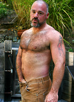 Muscle bear Bronson Gates shows his hairy muscle body and cock outdoors by Pantheon Bear With Bronson Gates