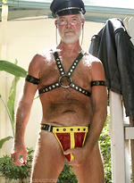 Thom Daddy wears leather gear by Hot Older Male