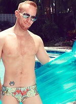 Steven Ponce posing by the pool by High Perfomance Men With Steven Ponce