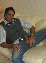 Marcello relaxes with a glass of red wine and his firm cock in his hand by With Marcello With Marcello