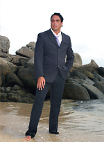 Marcello wearing a soaking wet business suit wanking on the rocks by With Marcello With Marcello