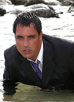 Marcello wearing a soaking wet business suit wanking on the rocks by With Marcello With Marcello