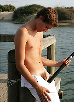 Rickie posing by the river by Enigmatic Boys