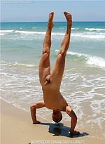 Stanley shows his perfect young muscled body on a beach by Enigmatic Boys