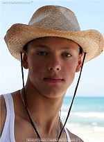 Stanley shows his perfect young muscled body on a beach by Enigmatic Boys