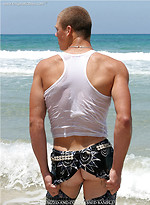Stanley shows his perfect young muscled body on a beach by Enigmatic Boys