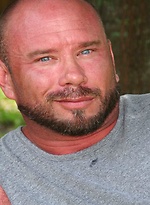 Brutal Bear James Anthony posing by Hairy and Raw
