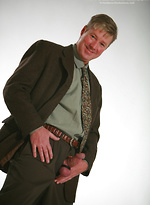 Gay in suit posing by Hot Older Male