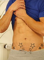 Tattooed stud Ryu Optys strokes his uncut cock. by BF Collection