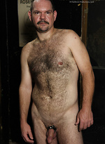 Old bear T-Rexxx strokes dick by Hot Older Male