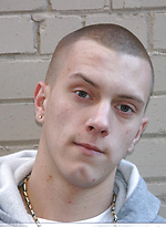 Shaved-headed stud Nick shows his inked body while masturbating on the bed by Nextdoor Buddies