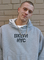 Shaved-headed stud Nick shows his inked body while masturbating on the bed by Nextdoor Buddies