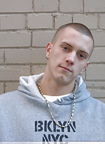 Shaved-headed stud Nick shows his inked body while masturbating on the bed by Nextdoor Buddies