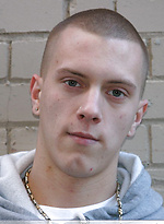 Shaved-headed stud Nick shows his inked body while masturbating on the bed by Nextdoor Buddies