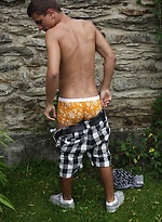 Hard bodied Jody busting a nut outdoors. by BF Collection