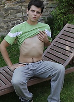 Peter Sweet in the backyard busting a nut on his stomach. by BF Collection