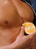 Michael Davids squeezes orange juice all over ripped body. by BF Collection
