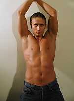 Michael Davids squeezes orange juice all over ripped body. by BF Collection