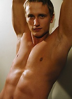 Michael Davids squeezes orange juice all over ripped body. by BF Collection