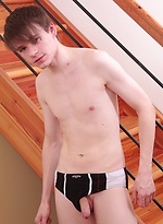 Smooth chested Jimmie pulls his uncut cock out from his black briefs. by BF Collection