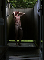 Parker posing outdoors by Playgirl