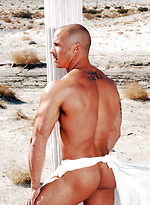Muscle hunk Brett shows his perfect sculpted body outdoors by Playgirl