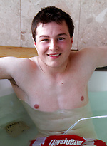 Aussie boy Damien Lance takes a hot tub dip by Bentley Race