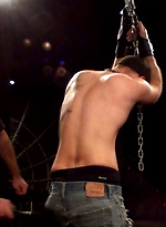 Sir has the boy right where he wants him, arms chained to the ceiling and awaiting punishment. by Iron Lockup