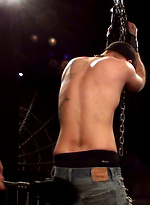 Sir has the boy right where he wants him, arms chained to the ceiling and awaiting punishment. by Iron Lockup