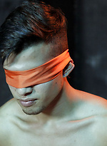 Nude young slave gets blindfolded at the dungeon by Bound Area